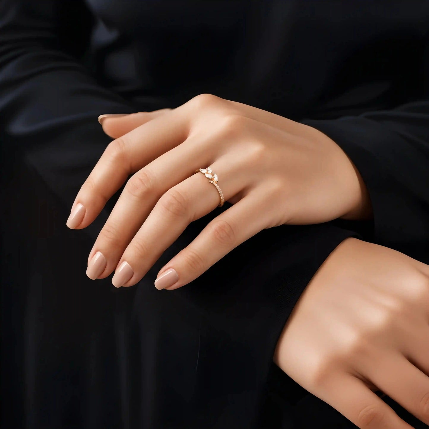 Engagement band with a Moissanites as main stones, White Zircon as side stones on a woman hand