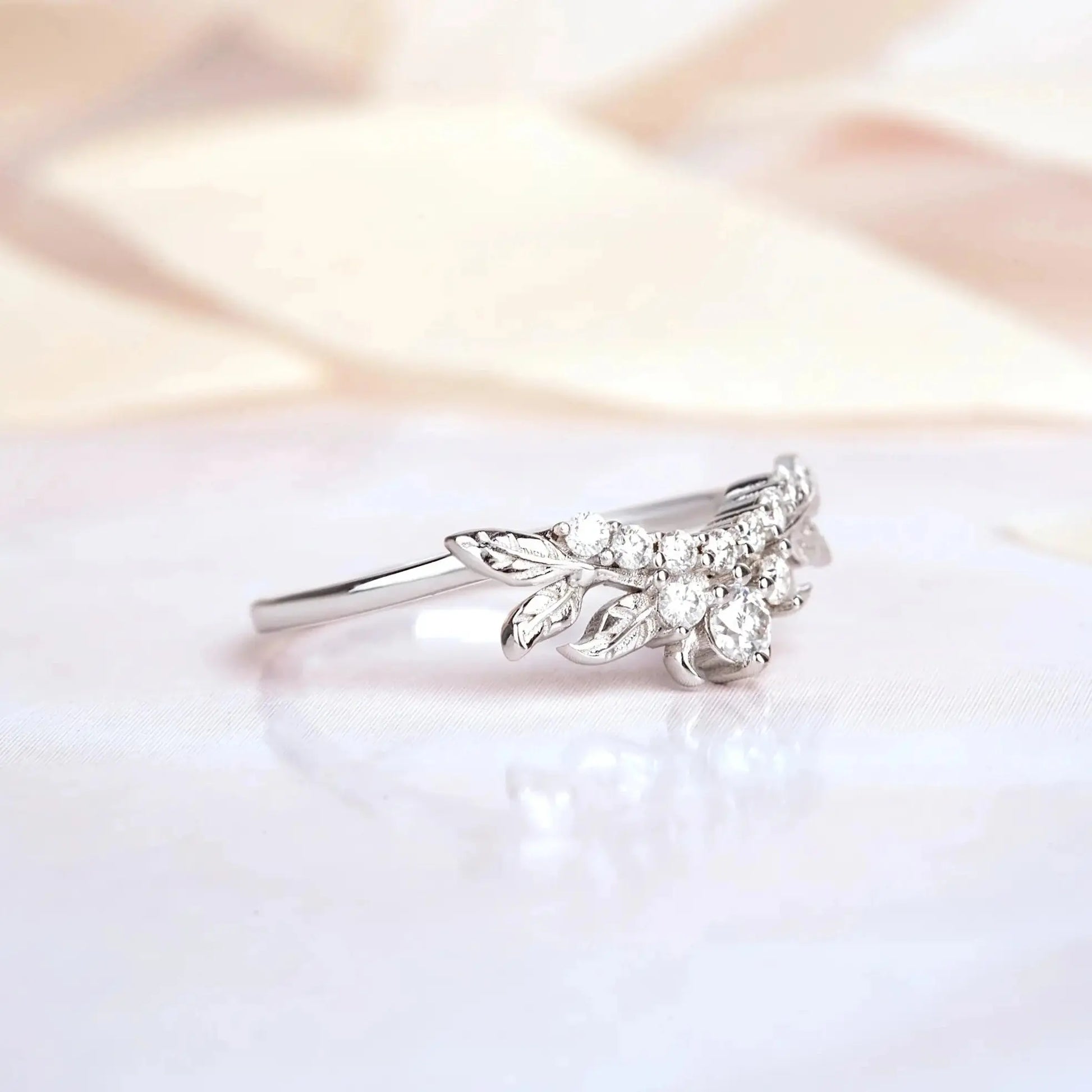 White gold ring with moissanite twig