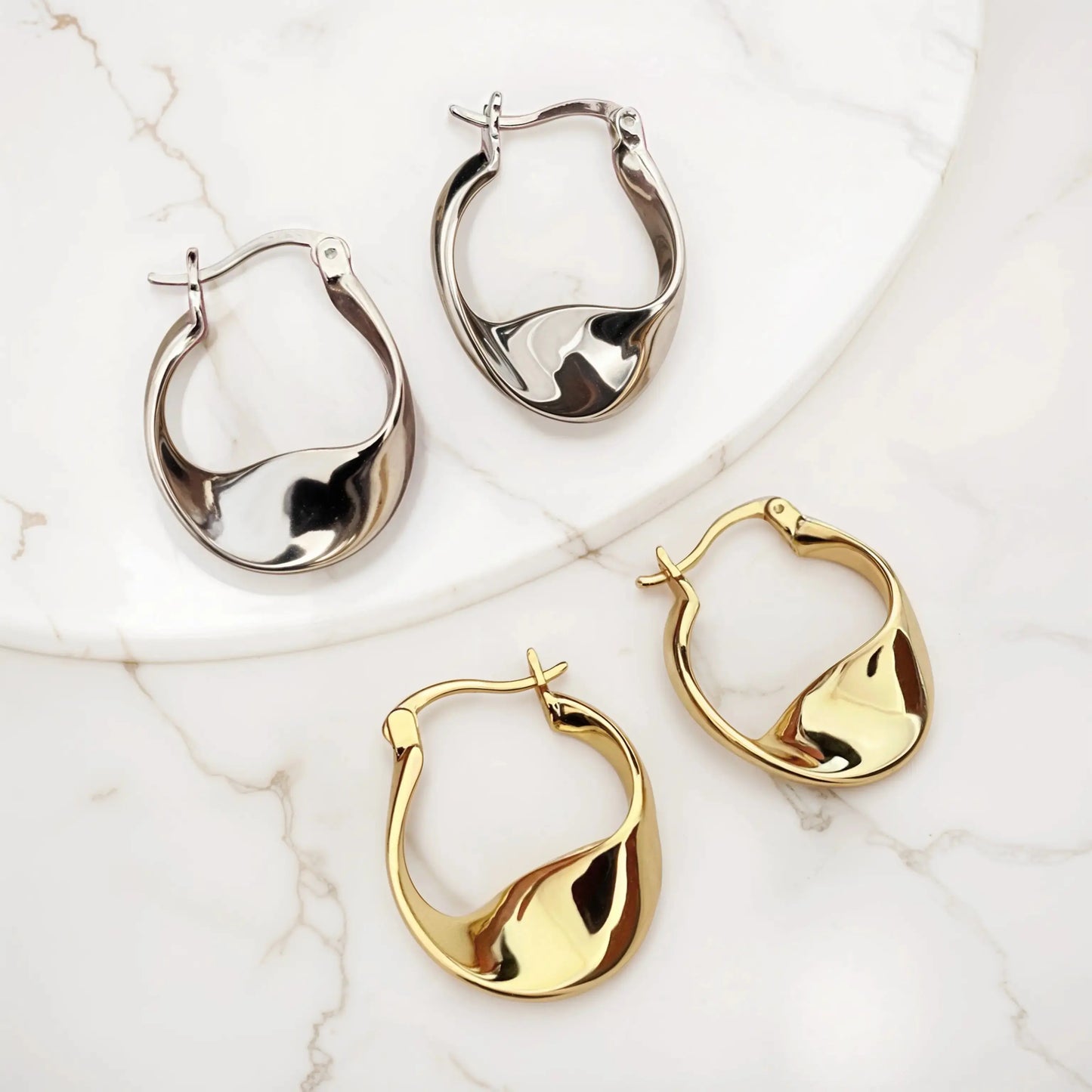Wavy hoop earrings 18K-White-Gold Earrings Starry Cradles 67.00
