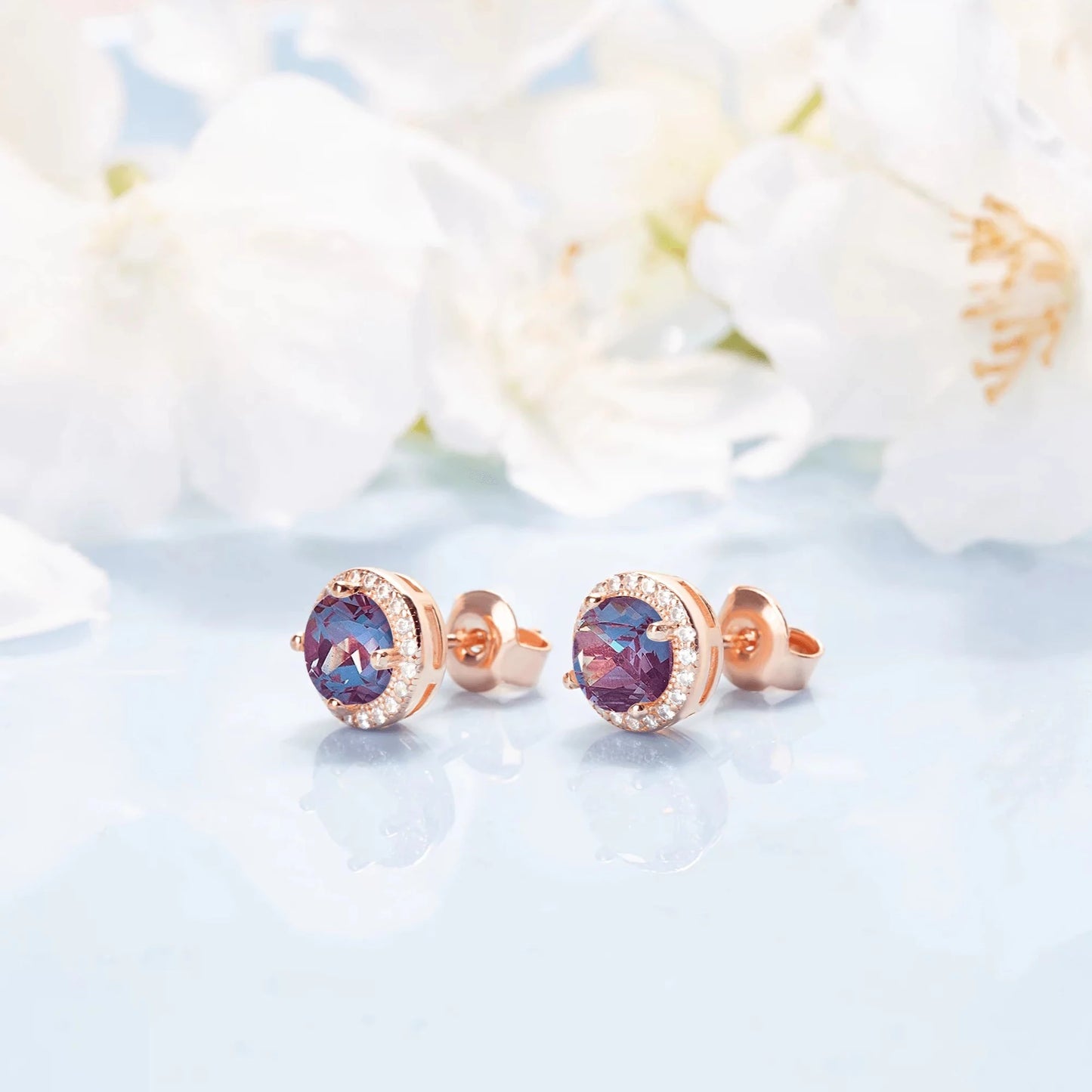 Alexandrite round studs in a color rose gold