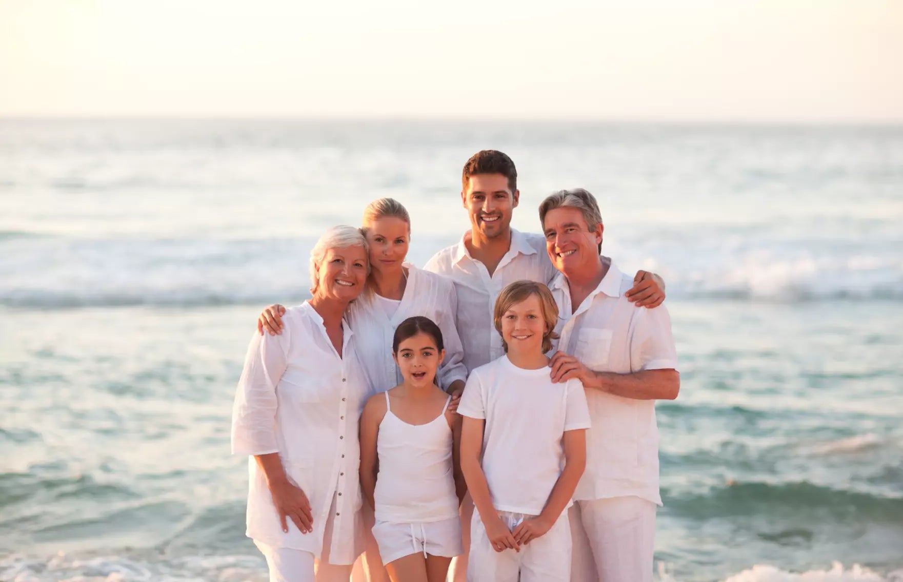 Family photo on a bank of a sea