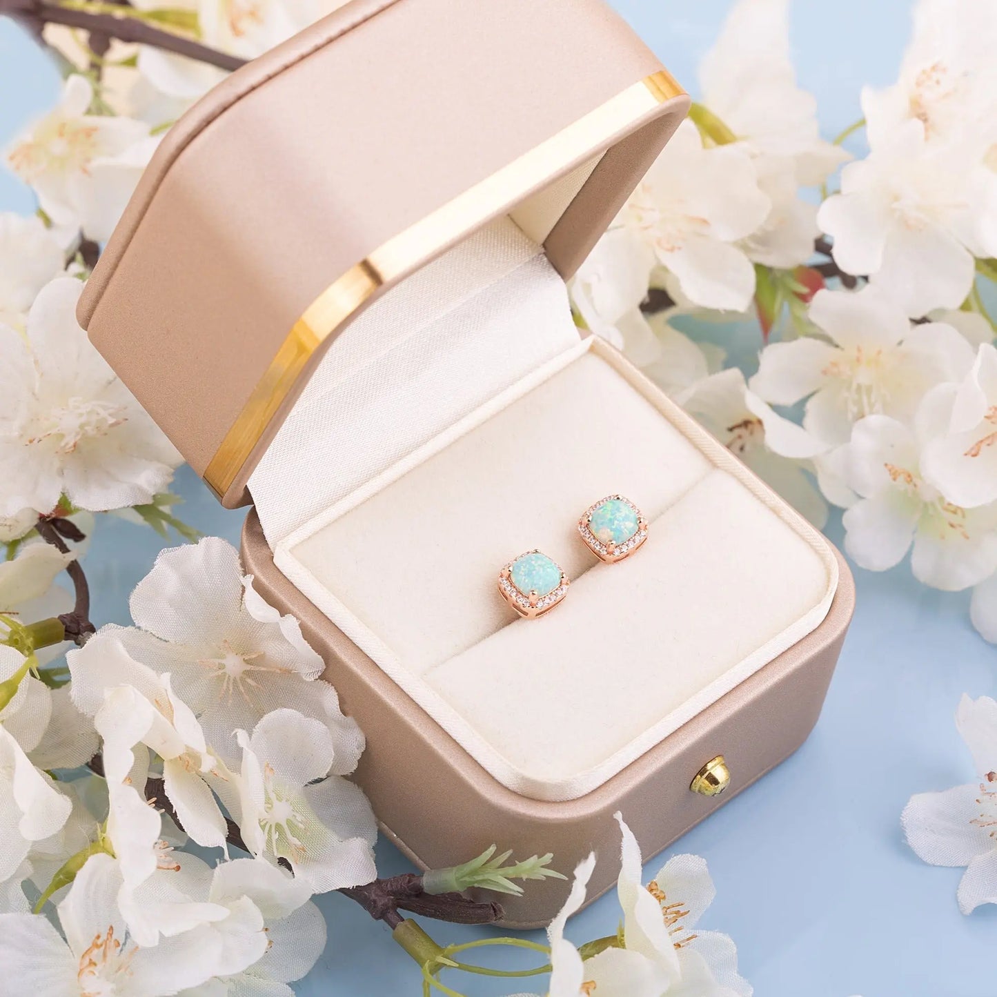 Two Green Opal square studs in a gift box