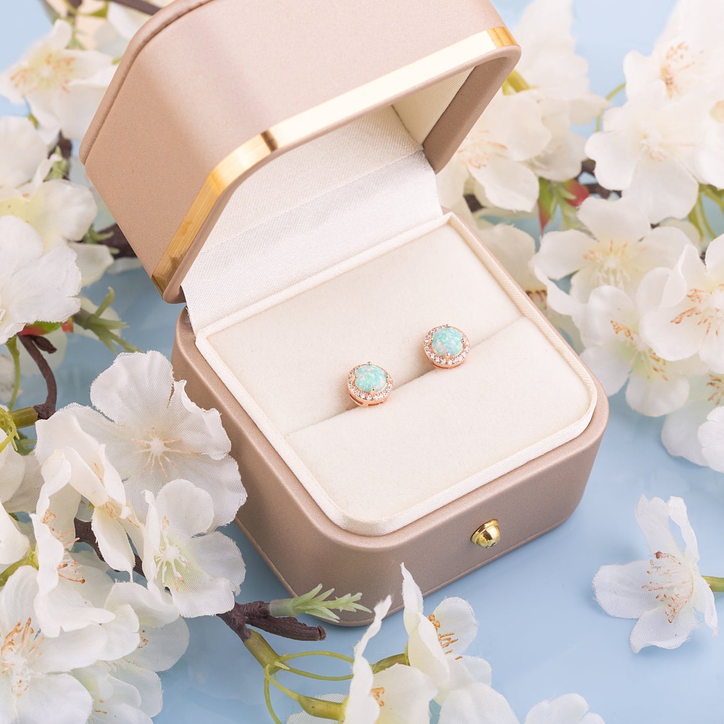 Two Green Opal Round studs in a gift box