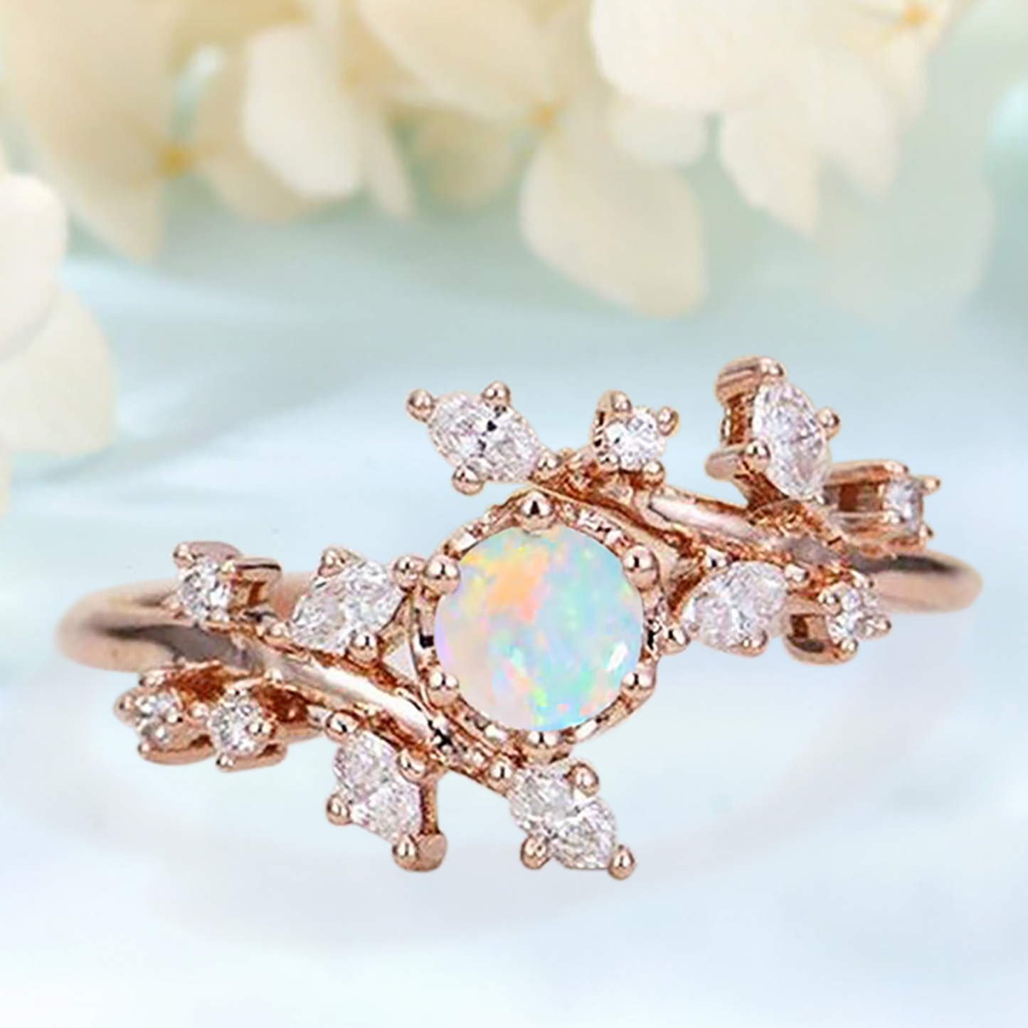 Ring with a White Opal as main stone and White Zircon