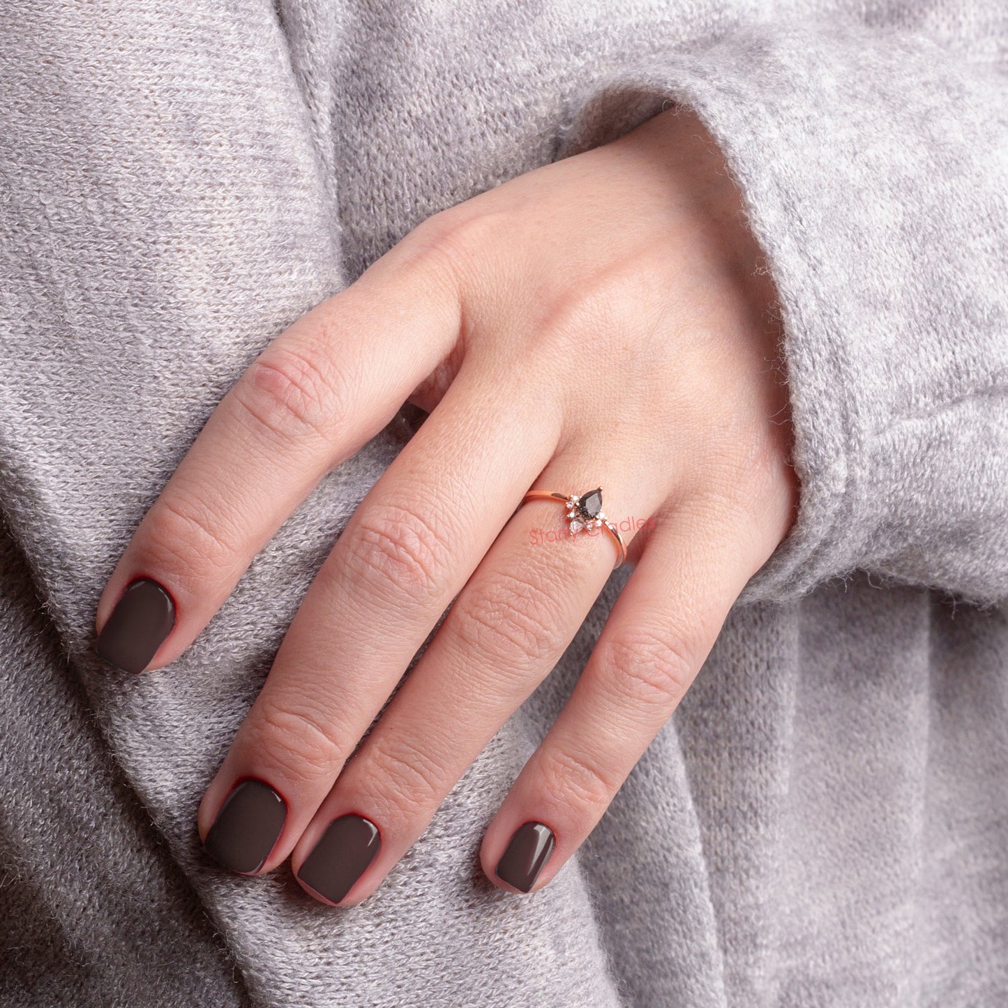 Black Rutilated Quartz & White Topaz ring on a woman hand