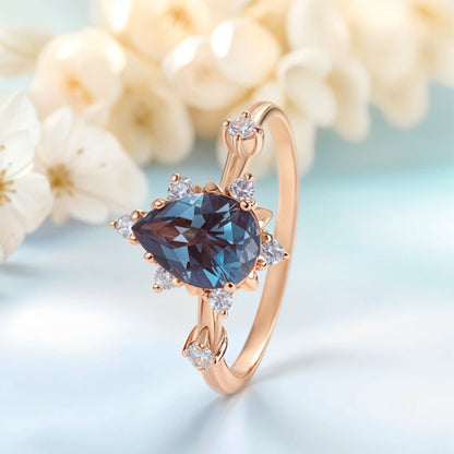 Zircon ring with dark blue alexandrite stone