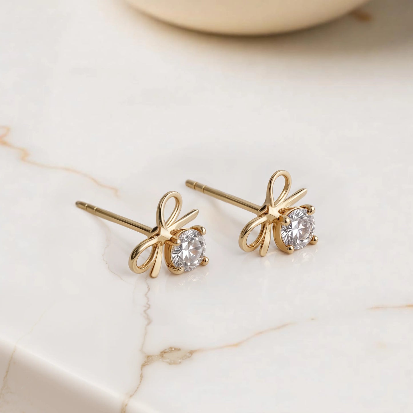 Bow stud earrings