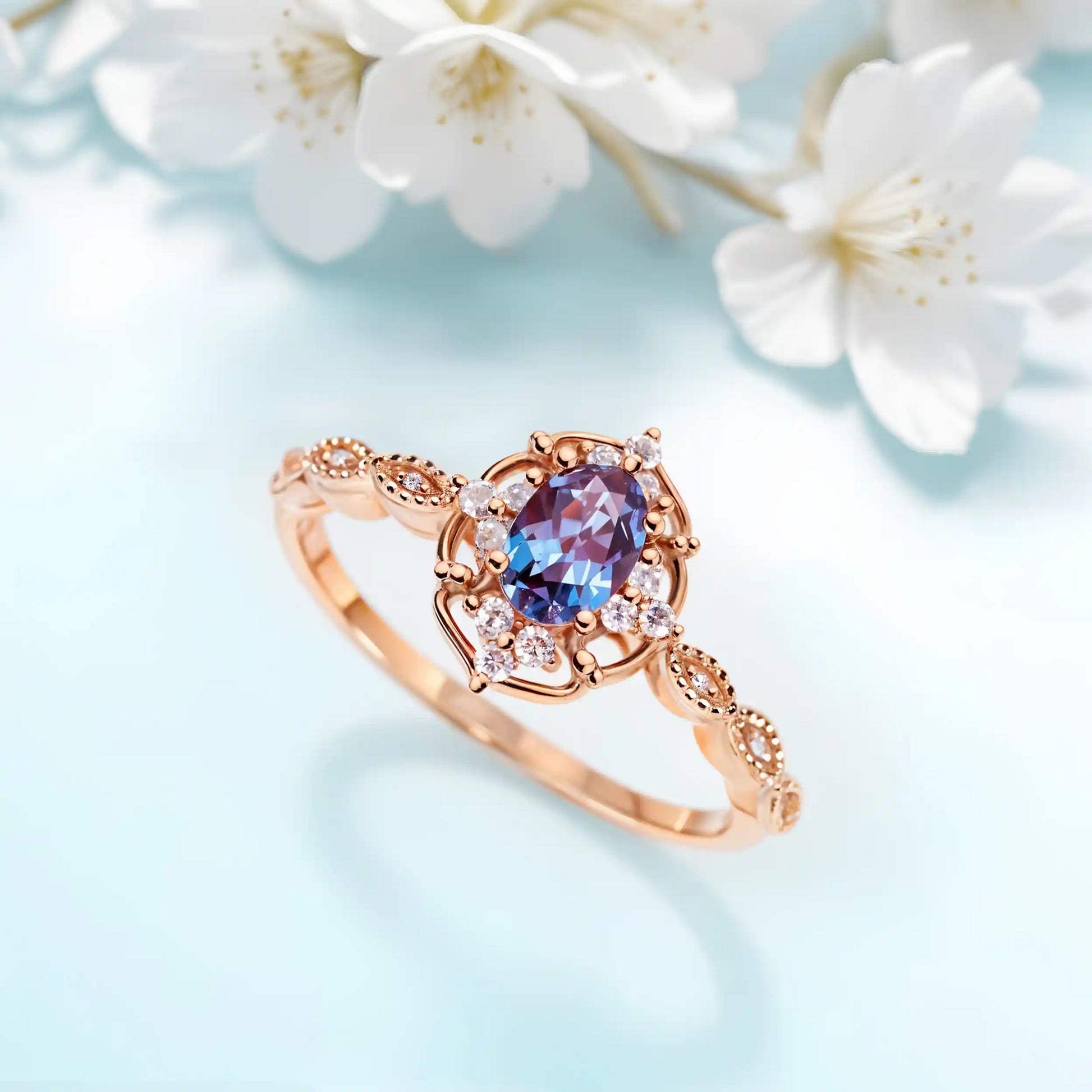 Wedding ring with alexandrite and white zircon gemstones, ring is plated with yellow gold