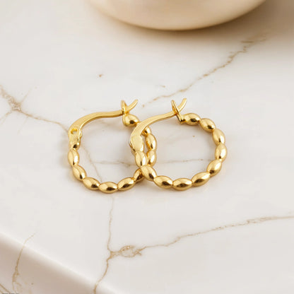 Three hoop earrings