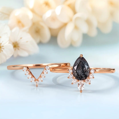 Two rings made from 18k Vermeil gold. One ring has white zircon gemstones and another ring has black quartz