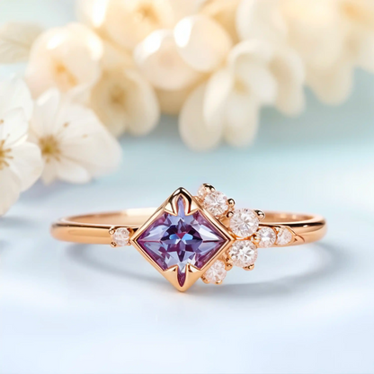 Zircon ring with a violet alexandrite stone