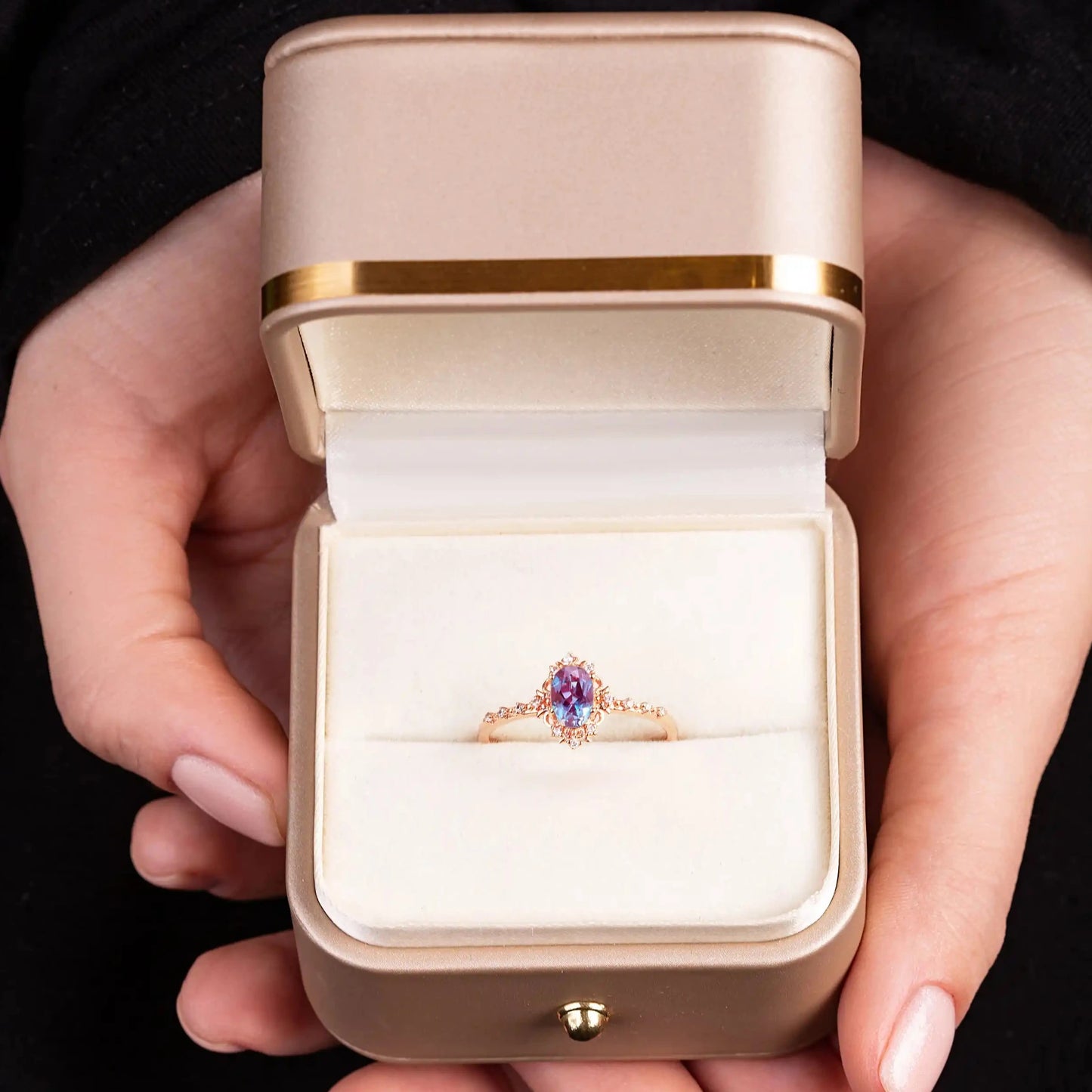 Аlexandrite wedding ring in a gold box