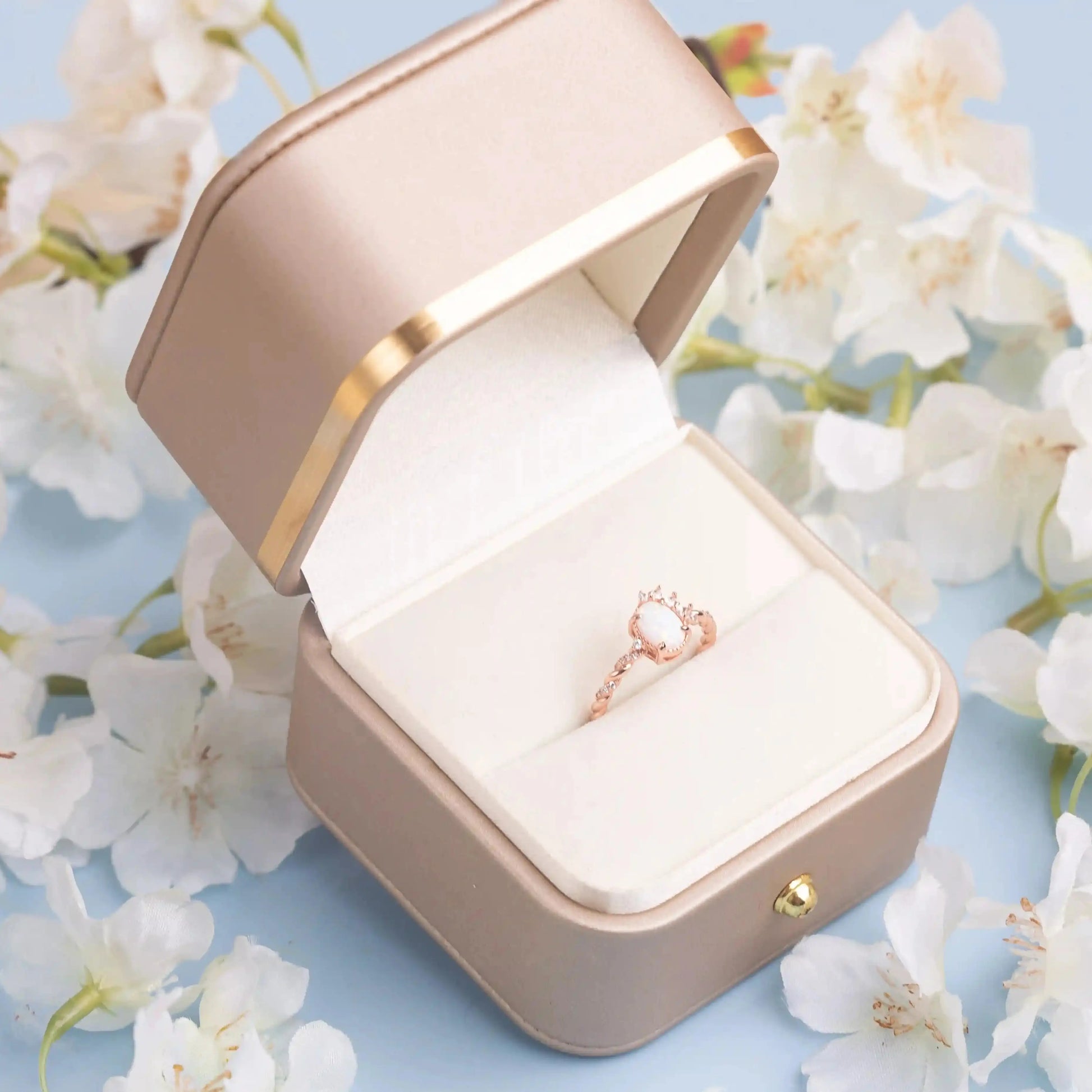 Opal Crown ring in a gold box