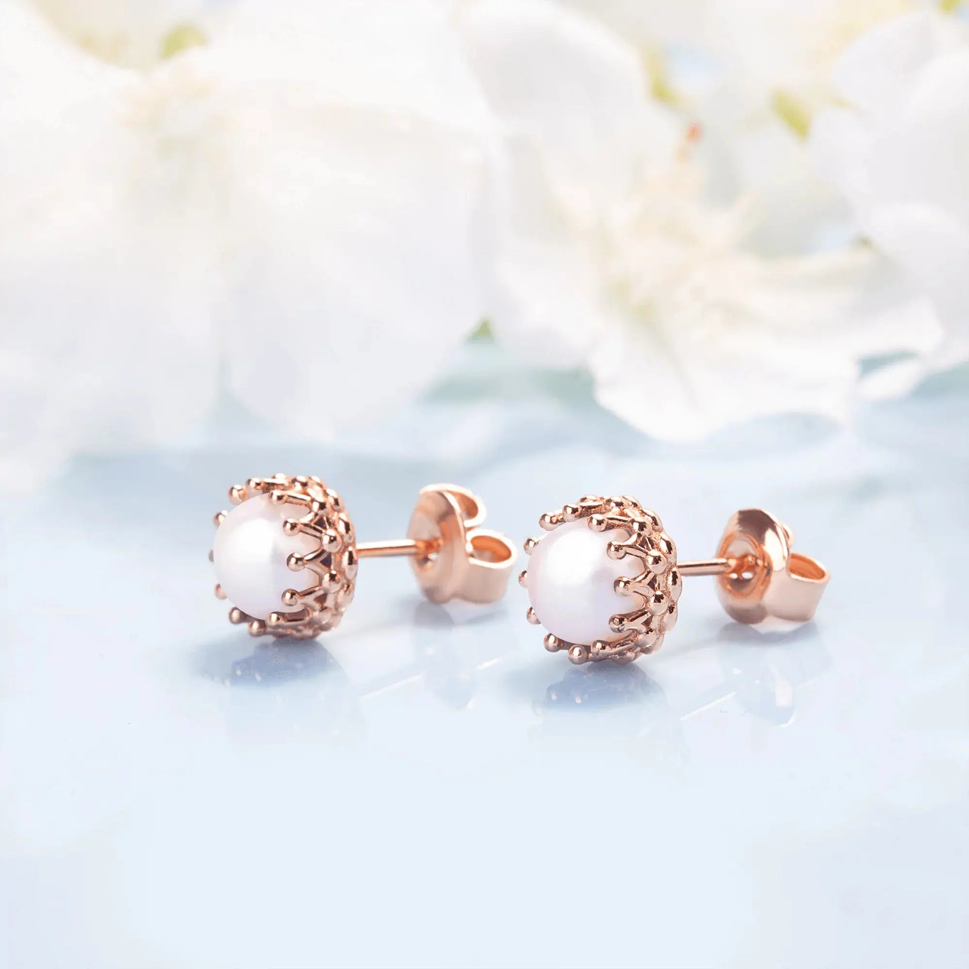 Pearl crown studs
