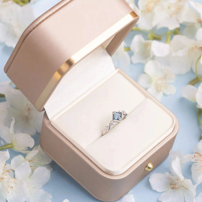 Princess Cut Alexandrite with a white gold in a gold box