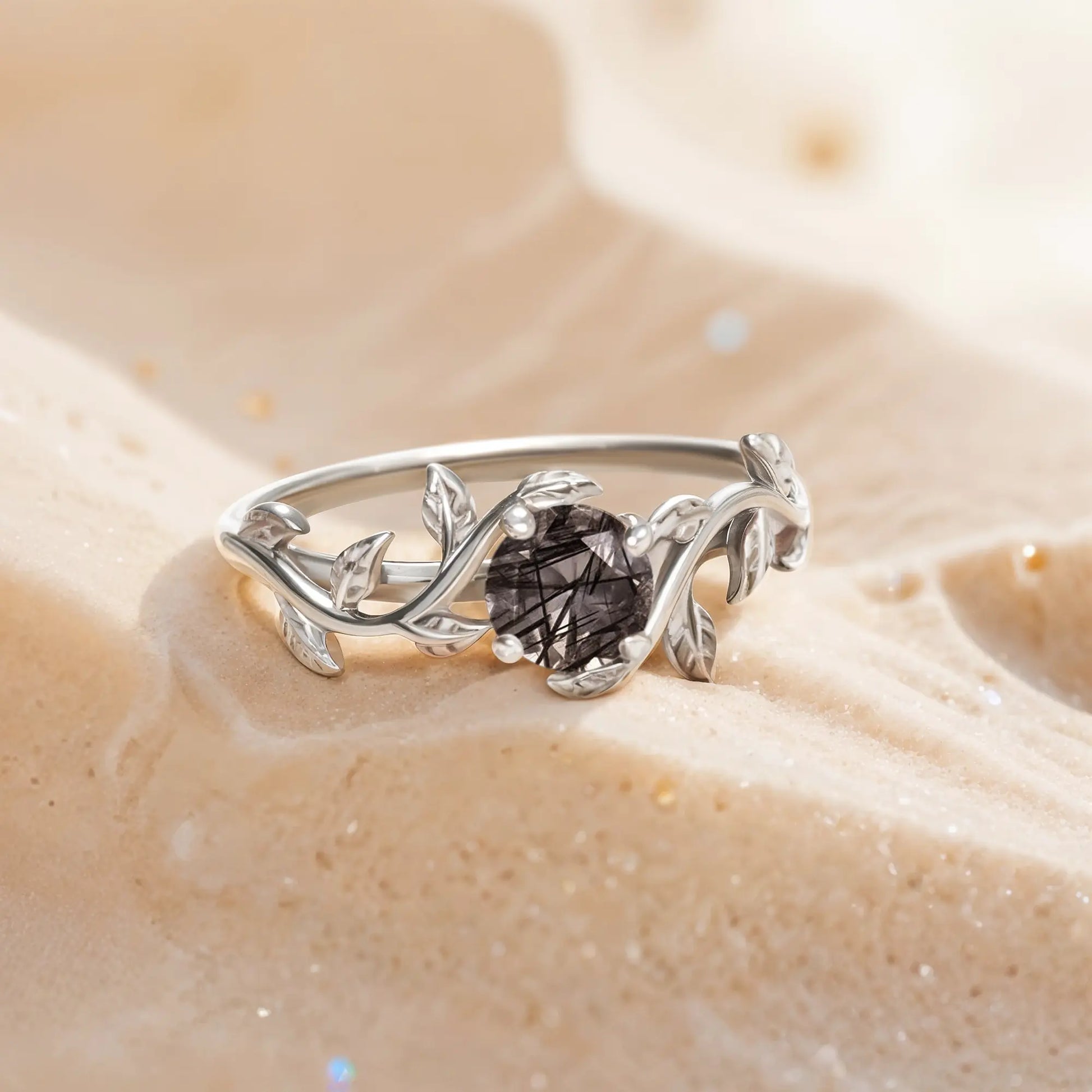 Ring for women with black quartz gemstone in a shape of twig.