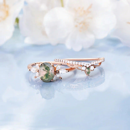 Wedding and engagement rings crafted with natural Moss Agate gemstones, offering a stylish and unique two-piece set