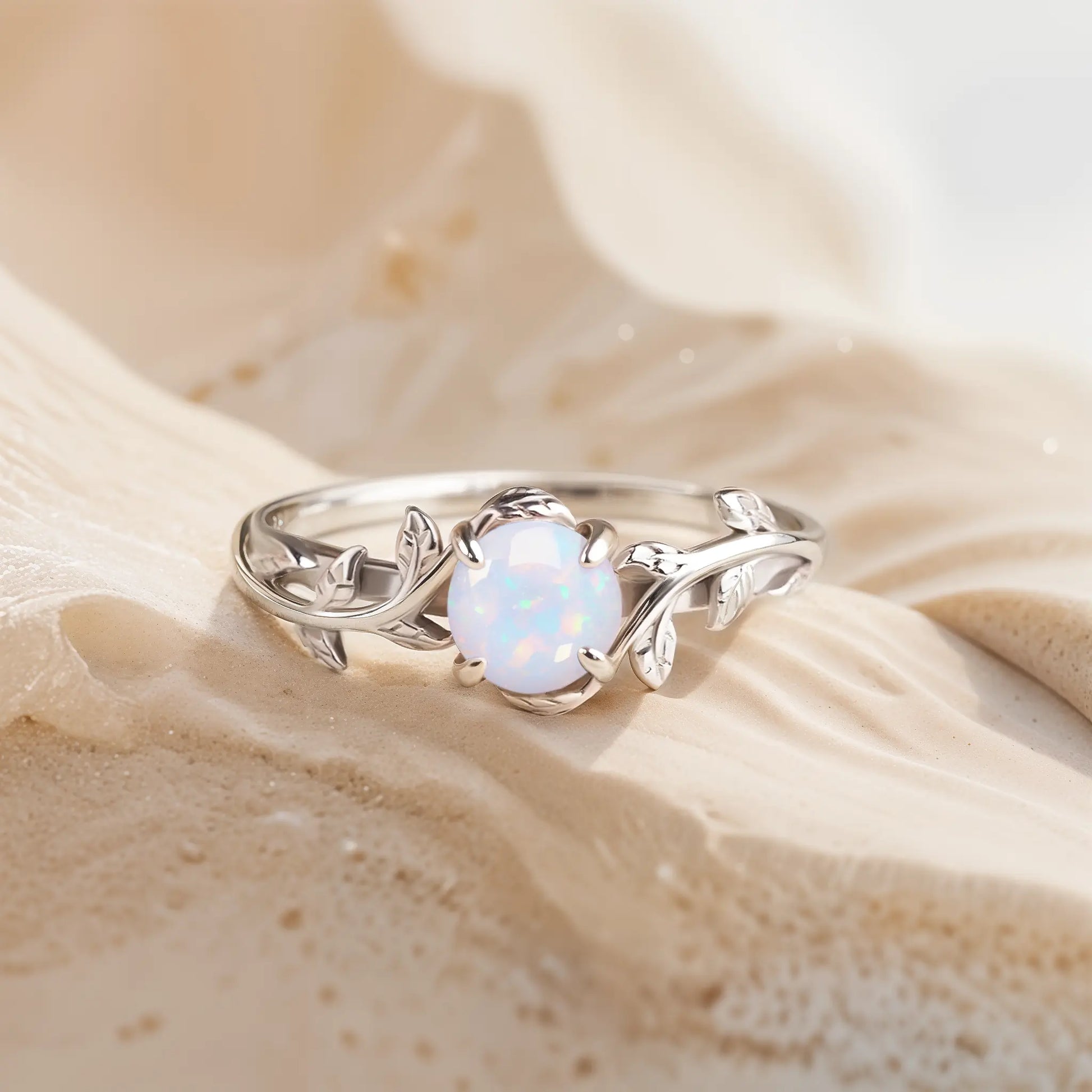 Unique opal ring with a twig band, perfect for nature lovers seeking an engagement ring, promise ring, white gold, silver.