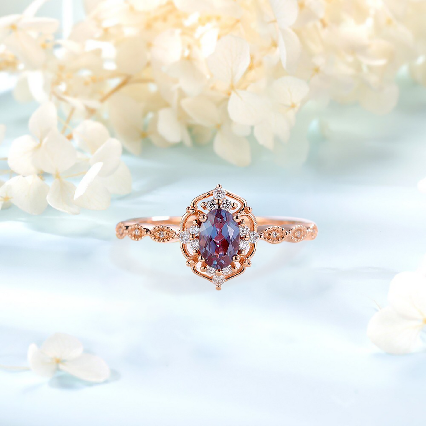 Zircon ring with an alexandrite stone with an orchid on a background