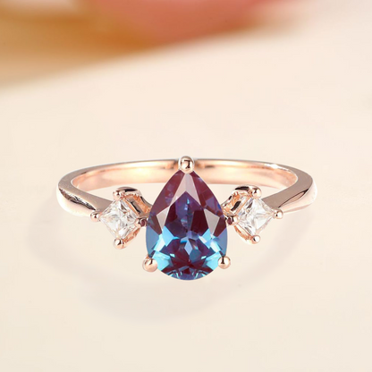 Engagement Ring with dark blue alexandrite stone