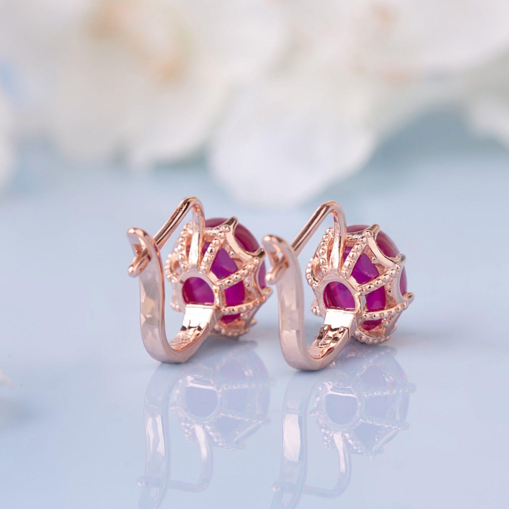 Two Red Ruby vintage earrings from the behind