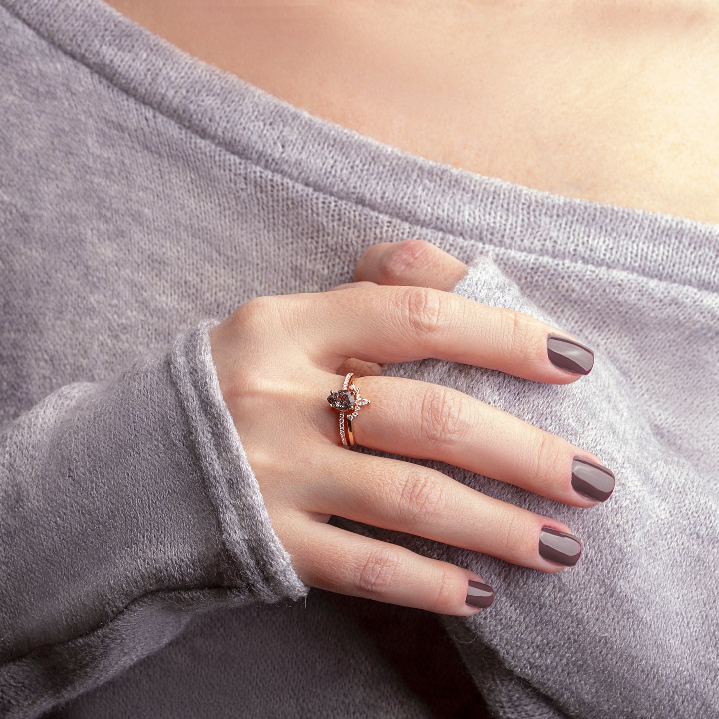 Black Rutilated Quartz, White Topaz and White Zircon rings set on a woman hand