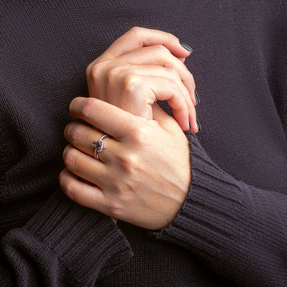 Black Rutilated Quartz, White Topaz and White Zircon rings set on a woman hand 