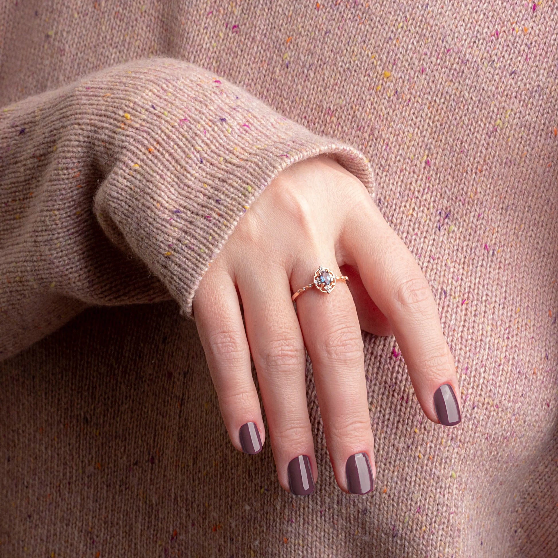 Antique-inspired vintage ring in rose gold with a dazzling alexandrite centerpiece, perfect as a unique engagement or promise ring