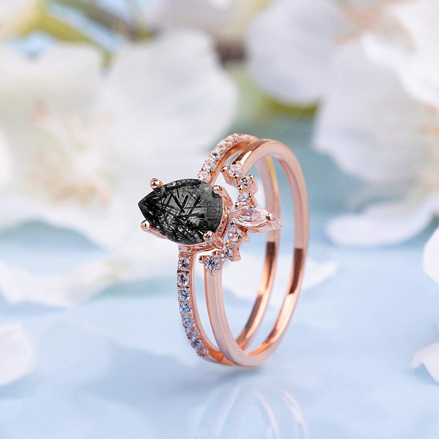 Black Rutilated Quartz, White Topaz and White Zircon rings set