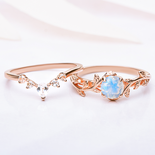 Silver Ring set for women. One ring in a form of twig with moonstone gemstone, another ring is v-shaped with zircon gemstones. Both rings are gold plated