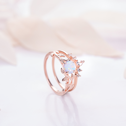 Elegant Twigs Ring Set with opal and topaz gemstones, crafted in a delicate leaf design for weddings or special promises.