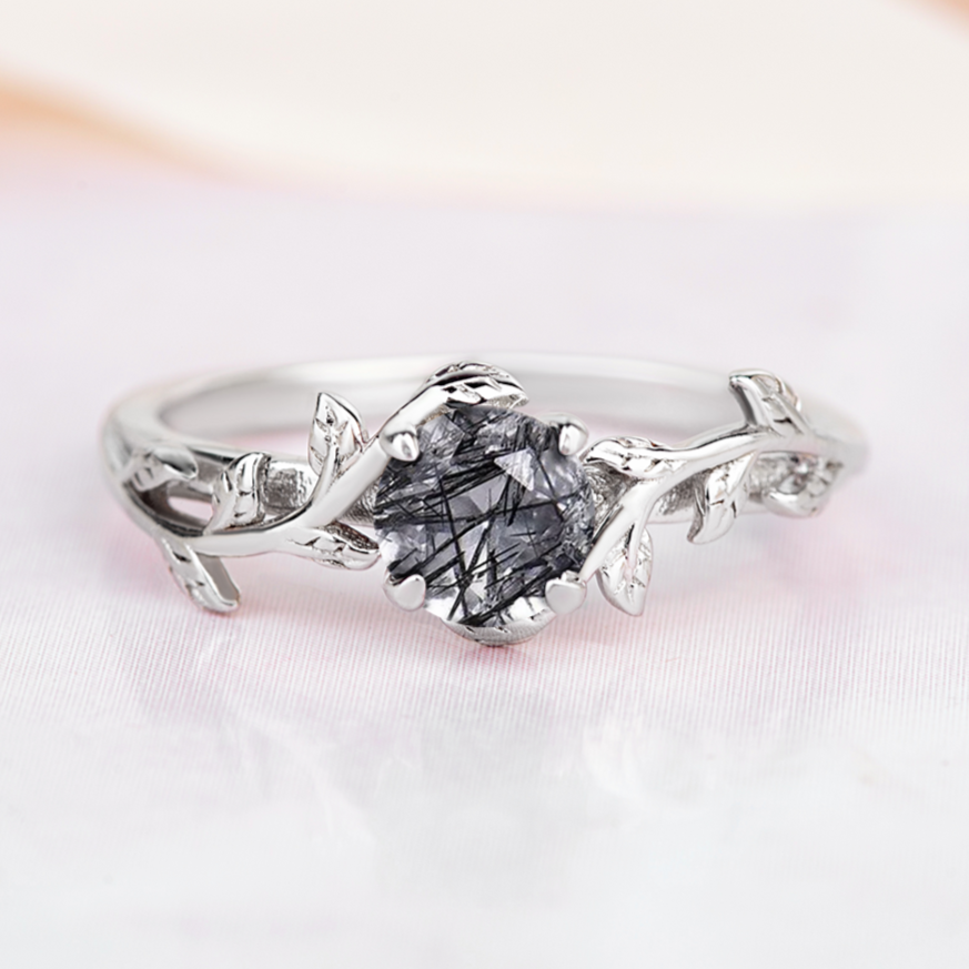 RIng for women with black quartz gemstone in a shape of twig.